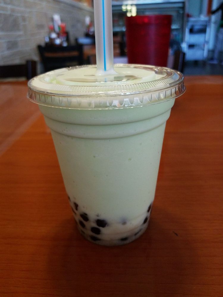 Honeydew bubble milk tea with tapioca pearls