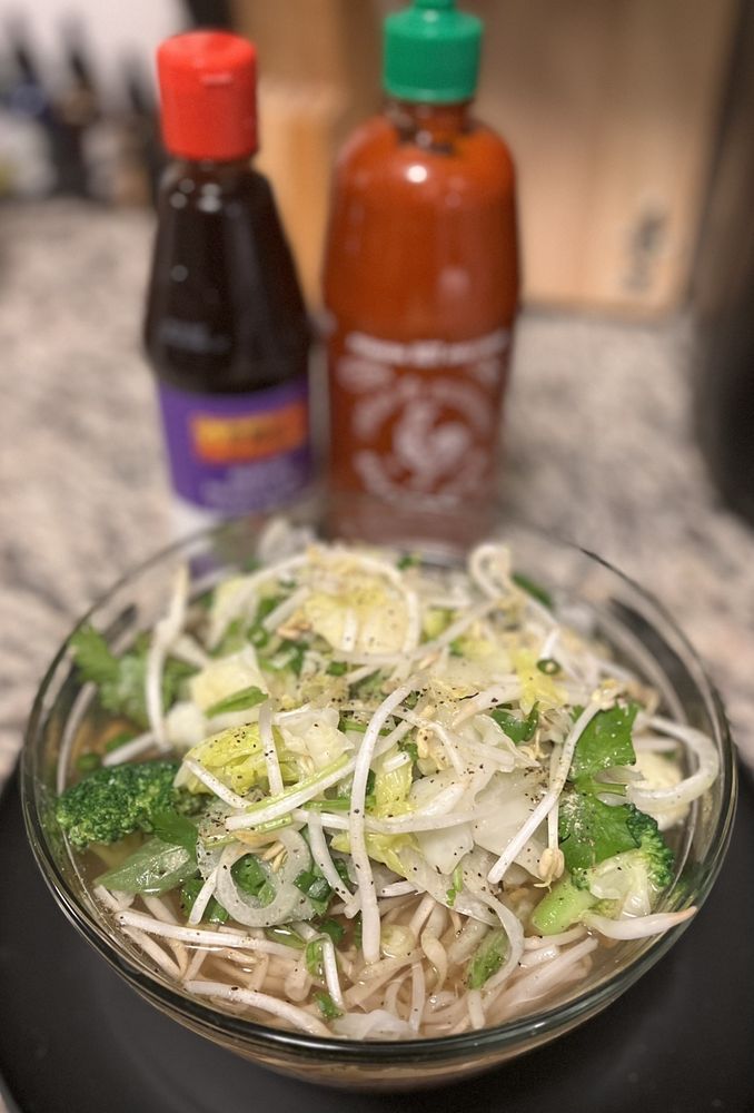 Veggie pho with fresh sprouts and herbs